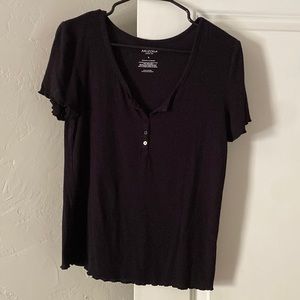 Black Henley style short-sleeved top with detailed sleeve and hem.